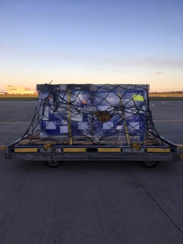 Air freight shipment on tarmac 